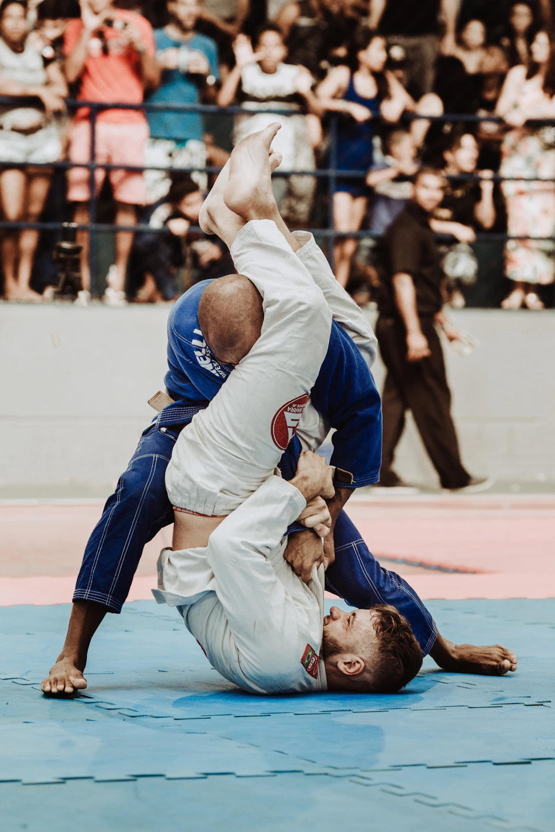 Unraveling the Battle: Striking vs. Grappling in MMA